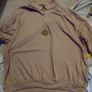 Brown Collared Sweater with a Sun on it